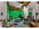 Bonus room featuring wood beam ceiling and a green screen on the back wall at 5310 Pebble Beach Dr # F, Orlando, FL 32811