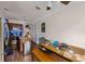 Kitchen and dining area featuring stainless steel appliances and wood floors at 5310 Pebble Beach Dr # F, Orlando, FL 32811