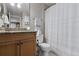 This bathroom has an updated vanity, a mirror, and a shower with curtain at 538 W Par St # 538, Orlando, FL 32804