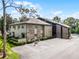 A multi-story condo with brick and siding exterior, with a parking lot in the front at 538 W Par St # 538, Orlando, FL 32804