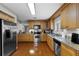 Updated kitchen features granite countertops, stainless steel appliances, and hardwood floors, with lots of counter space at 538 W Par St # 538, Orlando, FL 32804