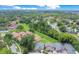 Scenic aerial view of a charming neighborhood with lush greenery and well-maintained homes at 545 Mystic Wood St, Casselberry, FL 32707