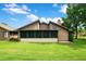 Charming home featuring a screened in patio and well-maintained lawn at 545 Mystic Wood St, Casselberry, FL 32707