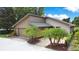 Charming home featuring a well-maintained lawn and driveway at 545 Mystic Wood St, Casselberry, FL 32707