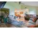Open living room layout with comfortable couches and glass coffee table at 545 Mystic Wood St, Casselberry, FL 32707