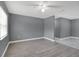 Open living space with wood-look floors, fresh paint, and abundant natural light at 606 Washington St, Daytona Beach, FL 32114