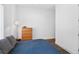 Cozy bedroom with a comfortable bed, wood dresser, and soothing natural light at 617 Worthington Dr, Winter Park, FL 32789