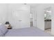 Bright bedroom featuring double closets, ensuite bathroom and neutral tones at 617 Worthington Dr, Winter Park, FL 32789
