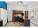 Well-lit home office with custom desk, cabinetry, and a bright window view at 617 Worthington Dr, Winter Park, FL 32789