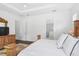 The main bedroom features natural light and a view to the ensuite bathroom at 617 Worthington Dr, Winter Park, FL 32789