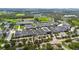 Aerial shot showcasing the schools with updated athletic facilities and beautiful landscaping at 705 Sunburst Cove Ln, Winter Garden, FL 34787