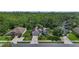 Beautifully landscaped single-Gathering home with well-maintained lawn and mature trees at 705 Sunburst Cove Ln, Winter Garden, FL 34787