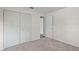 Bedroom featuring neutral walls, carpet, and a closet at 710 N Sparkman Ave, Orange City, FL 32763