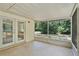 Sun Room featuring screened in windows, doors and an outdoor view at 710 N Sparkman Ave, Orange City, FL 32763