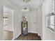 Utility room with washer-dryer hookups and hot water tank at 7612 Pomelo Dr, Orlando, FL 32819