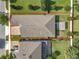 Aerial view showcasing the property's layout, landscaping and backyard pergola at 8030 John Hancock Dr, Winter Garden, FL 34787
