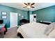 Comfortable bedroom with a ceiling fan, soft carpet, and relaxing atmosphere at 8030 John Hancock Dr, Winter Garden, FL 34787