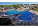 Resort-style community pool with ample lounge chairs and water features at 8030 John Hancock Dr, Winter Garden, FL 34787