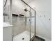 Walk-in shower features tiled walls, glass door, and modern shower head at 8030 John Hancock Dr, Winter Garden, FL 34787