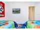 Colorful bedroom featuring fun decor at 8982 Cabot Cliffs Dr, Davenport, FL 33896