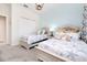 Inviting bedroom with two beds, soft lighting, and coastal-themed accents at 8982 Cabot Cliffs Dr, Davenport, FL 33896