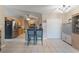 Well-lit kitchen with stainless steel appliances, center island, and tile flooring at 929 Louvre Ct, Kissimmee, FL 34759