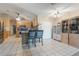 Spacious kitchen with tiled floors, stainless steel appliances, and ample storage at 929 Louvre Ct, Kissimmee, FL 34759