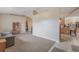 Open living area showcasing seamless flow and access to the kitchen and dining spaces at 929 Louvre Ct, Kissimmee, FL 34759