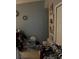 Spare bedroom featuring tiled floors, closet, pictures and decor on neutral-colored walls at 976 Alicante Ave, Orlando, FL 32807