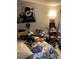 Untidy bedroom with basketball hoop, artwork, and neutral-toned walls at 976 Alicante Ave, Orlando, FL 32807