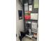 Furnace and utility closet featuring exposed piping and assorted wall warnings at 976 Alicante Ave, Orlando, FL 32807