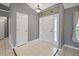 Foyer with tile flooring and high ceiling at 10697 Lake Hill Dr, Clermont, FL 34711
