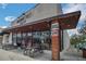 Exterior view of Montrose Street Market, showcasing its inviting storefront and outdoor seating at 10697 Lake Hill Dr, Clermont, FL 34711