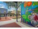 Charming street view showcasing colorful murals in historic downtown Clermont, Florida at 10697 Lake Hill Dr, Clermont, FL 34711