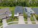 Aerial view of a well-maintained property with manicured lawn and landscaping at 1224 Hillcrest View Loop, Apopka, FL 32703
