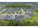 Expansive aerial view of the property showcasing the pool and surrounding neighborhood at 1224 Hillcrest View Loop, Apopka, FL 32703