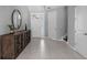 Bright foyer featuring stylish console table and tile flooring at 1224 Hillcrest View Loop, Apopka, FL 32703