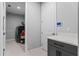 Modern laundry room featuring a washer, dryer, and plenty of storage space at 1224 Hillcrest View Loop, Apopka, FL 32703
