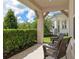 Inviting patio area with comfortable seating, perfect for relaxation at 1224 Hillcrest View Loop, Apopka, FL 32703