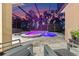 Inviting screened pool and spa with a waterfall feature provides an ideal space for relaxation and entertainment at 1224 Hillcrest View Loop, Apopka, FL 32703