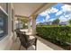 Relaxing front porch with seating offers a welcoming entrance at 1224 Hillcrest View Loop, Apopka, FL 32703