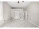 Large bedroom featuring tile floors and a closet at 13848 Vista Del Lago Blvd, Clermont, FL 34711