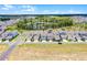 Expansive aerial view of the neighborhood showcasing the home's prime location near a serene lake at 15133 Summer Harvest St, Winter Garden, FL 34787
