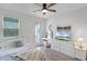 Bedroom with good natural light, closet, and white furniture at 15133 Summer Harvest St, Winter Garden, FL 34787
