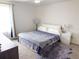 Cozy bedroom with plush rug, natural light, and modern decor at 1588 Sky Lakes Dr, St Cloud, FL 34769