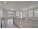 Open-concept kitchen with a central island, modern appliances, and ample natural light creates a bright and inviting atmosphere at 172 S Zuni Rd, St Cloud, FL 34771