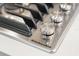 Close up of cooktop with stainless steel accents and KitchenAid emblem at 174 Promenade Cir, Lake Mary, FL 32746