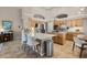 Well-equipped kitchen with a spacious island, stainless steel appliances, and stylish finishes at 174 Promenade Cir, Lake Mary, FL 32746