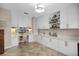 Office featuring tiled floor, white cabinets and drawers, and a comfortable chair at 174 Promenade Cir, Lake Mary, FL 32746