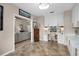 Office featuring tiled floor, white cabinets and drawers, and a comfortable chair at 174 Promenade Cir, Lake Mary, FL 32746